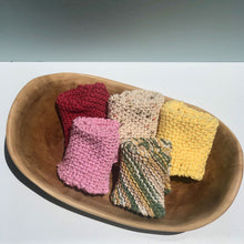 Load image into Gallery viewer, Arbor Novo&#39;s sustainable washcloths in various colors.

