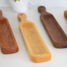 Load image into Gallery viewer, Arbor Novo cherry, maple, and black walnut wooden cheese &amp; cracker trays in the kitchen
